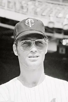 Dave Boswell Wearing Baseball Cap and sunglasses