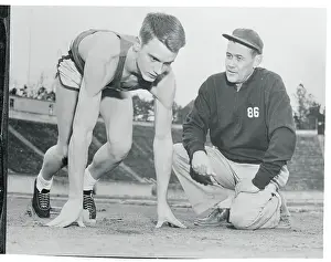 Durham Prints: Dave Sime Reaching Instructions From His Coach