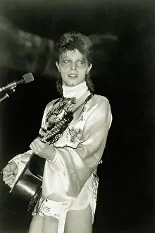 David Bowie Playing Guitar in Concert