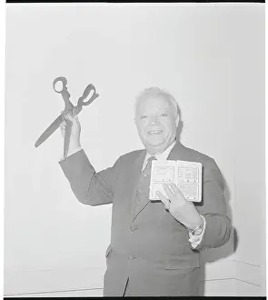 David Dubinsky Holding Large Cutting Shears
