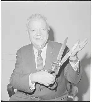 David Dubinsky Holding Large Cutting Shears