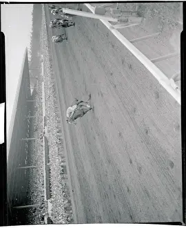 David Erb Riding Horse Around the Track