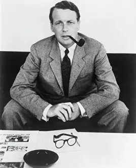 Eyeglasses Prints: David Ogilvy with Smoking Pipe