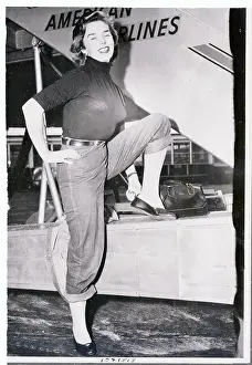 Dawn Adams Posing near Airplane