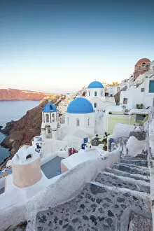 Famous Gallery: Dawn over famous village of Oia, Santorini, Greece