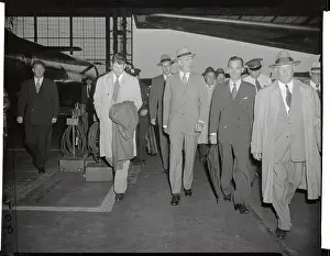 Dean Acheson Being Escorted at Airport