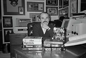 Dean Koontz Sitting at His Desk