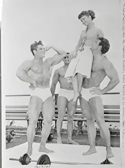 Debbie Reynolds with Bodybuilders