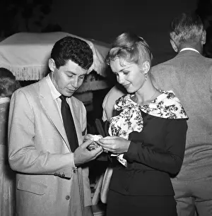 7 11 17 Reynolds Prints: Debbie Reynolds and Eddie Fisher Attend an Event