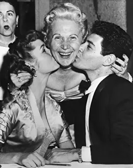 Debbie Reynolds and Eddie Fisher Kissing Jennie Grossinger