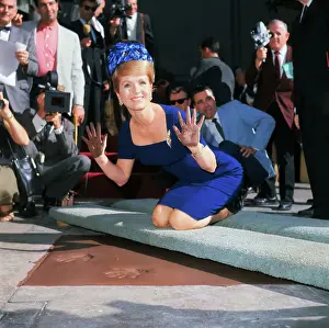 Debbie Reynolds Holding Up Her Cement Covered Hands