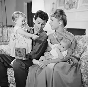 Debbie Reynolds and Husband Holding Their Children