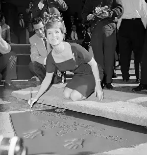 Debbie Reynolds Signing Her Name on Hollywood Pavement
