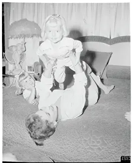 Debra Paget Playing with Her Nieces