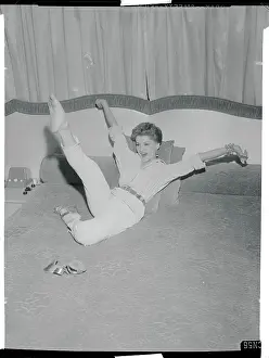 Debra Paget Stretching on Her Bed