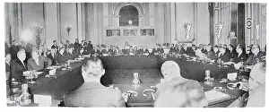 Delegates Sitting at Tables During a Conference