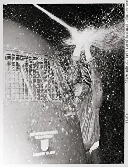 German Text Prints: Demonstrator Blocks Water Cannon