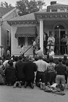 Demonstrators Kneeling In Prayer