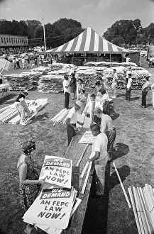 Demonstrators At Tent Preparing Signs