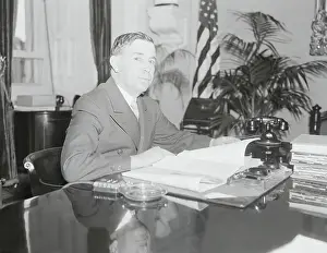 Dennis Chavez at Work in His Office