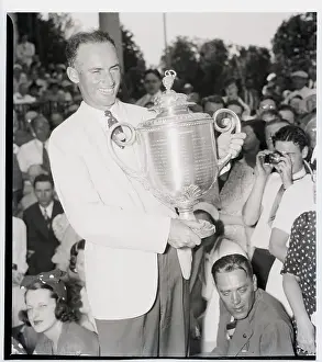 Trophy Prints: Denny Shute Holding Golf Trophy