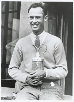 Andrews Prints: Denny Shute Holding Trophy