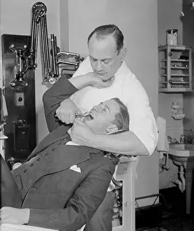 Powerful Prints: Dentist Extracting Molars