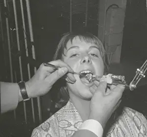 Munich Prints: Dentist Working with Luminore Dental Drill