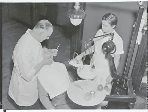 Dentists Working on Patient