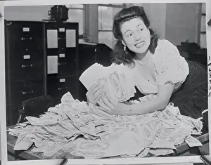 Deputy Marshal Doris Brown with Mound of Counterfeit