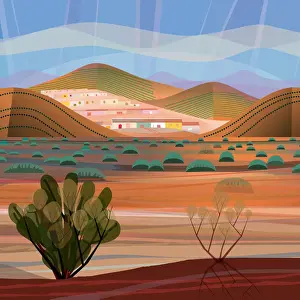 Desert Landscape looking out from mountaintop to valley and mountain village in distance