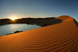 Sunse Gallery: Desert Oasis and the Red Sand Dunes of Sossusvlei, Namib-Naukluft National Park, Namibia, Africa