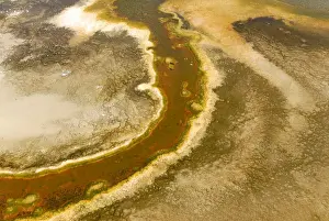 Geyser Prints: Detailed view of the discoloration caused by bacteria and algae on a geyser