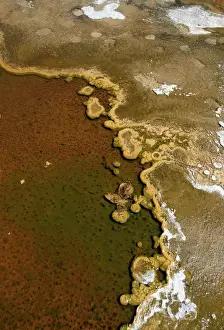 Geyser Prints: Detailed view of the discoloration caused by bacteria and algae on a geyser