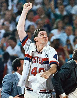 Detroit Pistons Bill Luimbeer Raising His Arm in Jubilation
