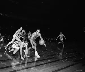 Dick McGurie Diving for a Loose Ball