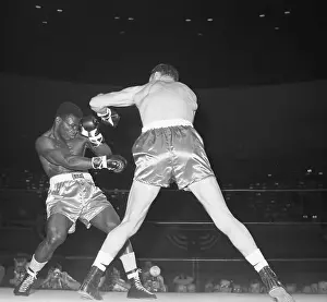 Dick Tiger and Roger Rouse in Boxing Action