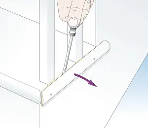 Digital illustration showing how to prise off planted moulding between balusters using flat-head screwdriver