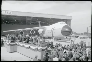 Heavy Prints: Dignitaries Watching Lockheed C-5 Galaxy Aircraft Exit Hangar