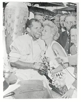 Dinah Shore Kissing Bob Sweikert