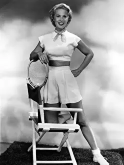 Dinah Shore Portrait with Tennis Racquet