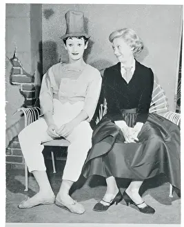 Dinah Shore Sitting Next to Marcel Marceau