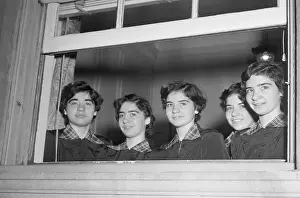 Marie Dionne Prints: Dionne Quintuplets Looking Out a Window