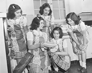 Marie Dionne Prints: Dionne Sisters Admiring Pie