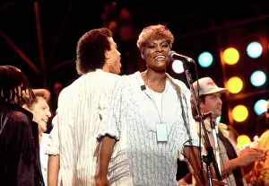 Iconic Concert Prints: Celebrate the Unforgettable Music Event That United the World: Dionne Warwick With Lionel Richie At Live Aid