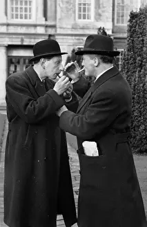 Prints of 28th February 1953: Actor Geoffrey Sumner learning the pickpocket's art from former policeman Bob Fabian (right) for a Rank film Always A Bride' A Photographic Legacy: Dipping