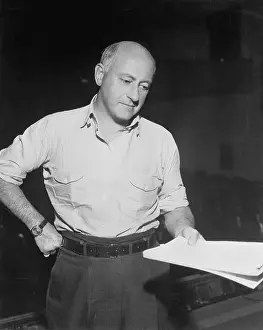 Cecil B Prints: Director Cecil B. DeMille Holding Script