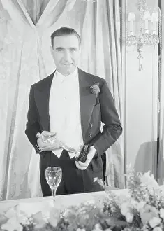 Director Frank Lloyd Holding Trophy for Calvacade