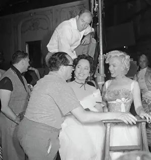 Screenwriter Prints: Director Henry Koster Joking with Marilyn Monroe