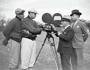 Filming Prints: Dizzy And Daffy Dean Examining Camera